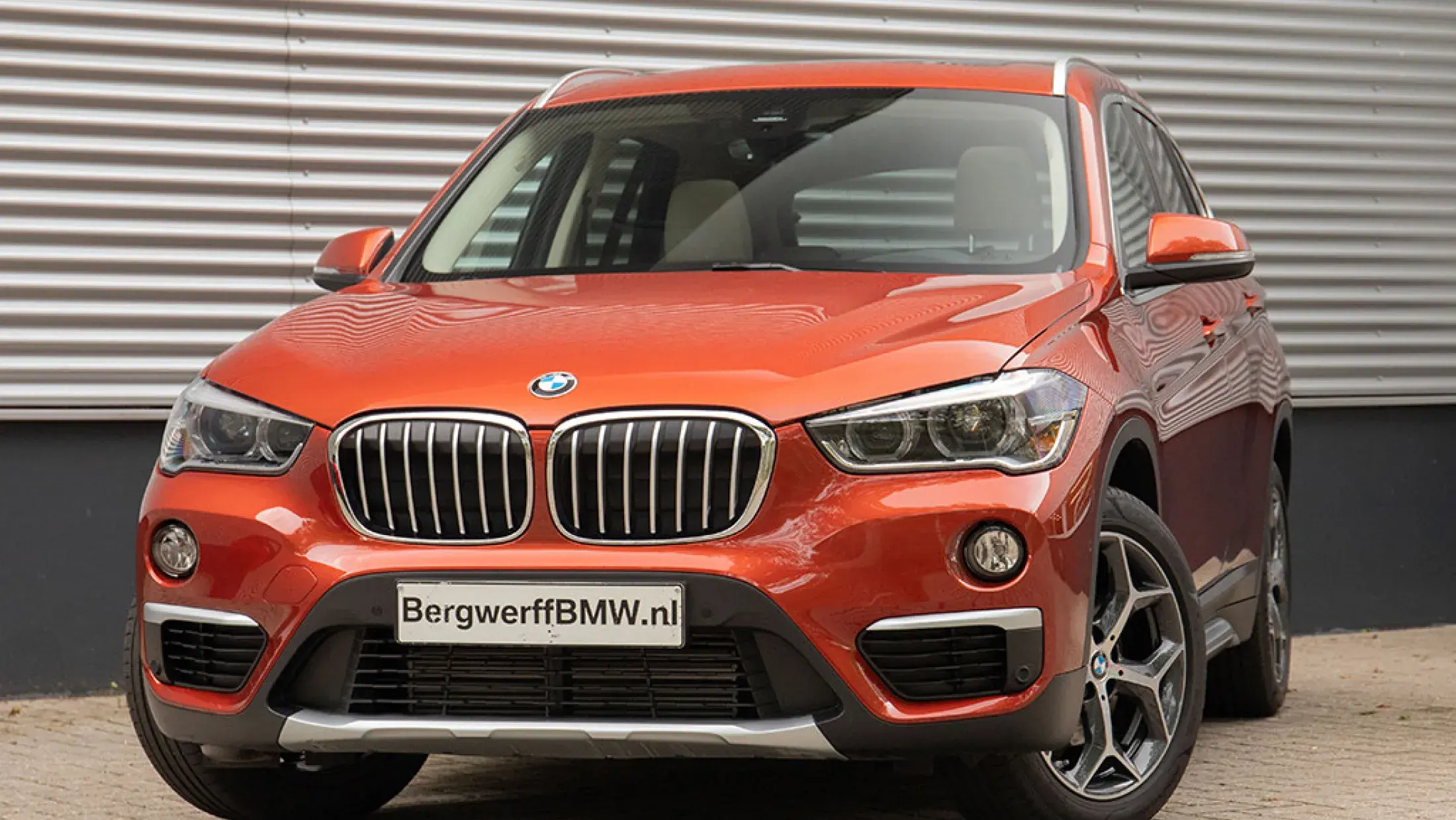 BMW X1 xDrive18d Memoryzetels Sunset Orange Dakota Oyster F48 Bergwerff