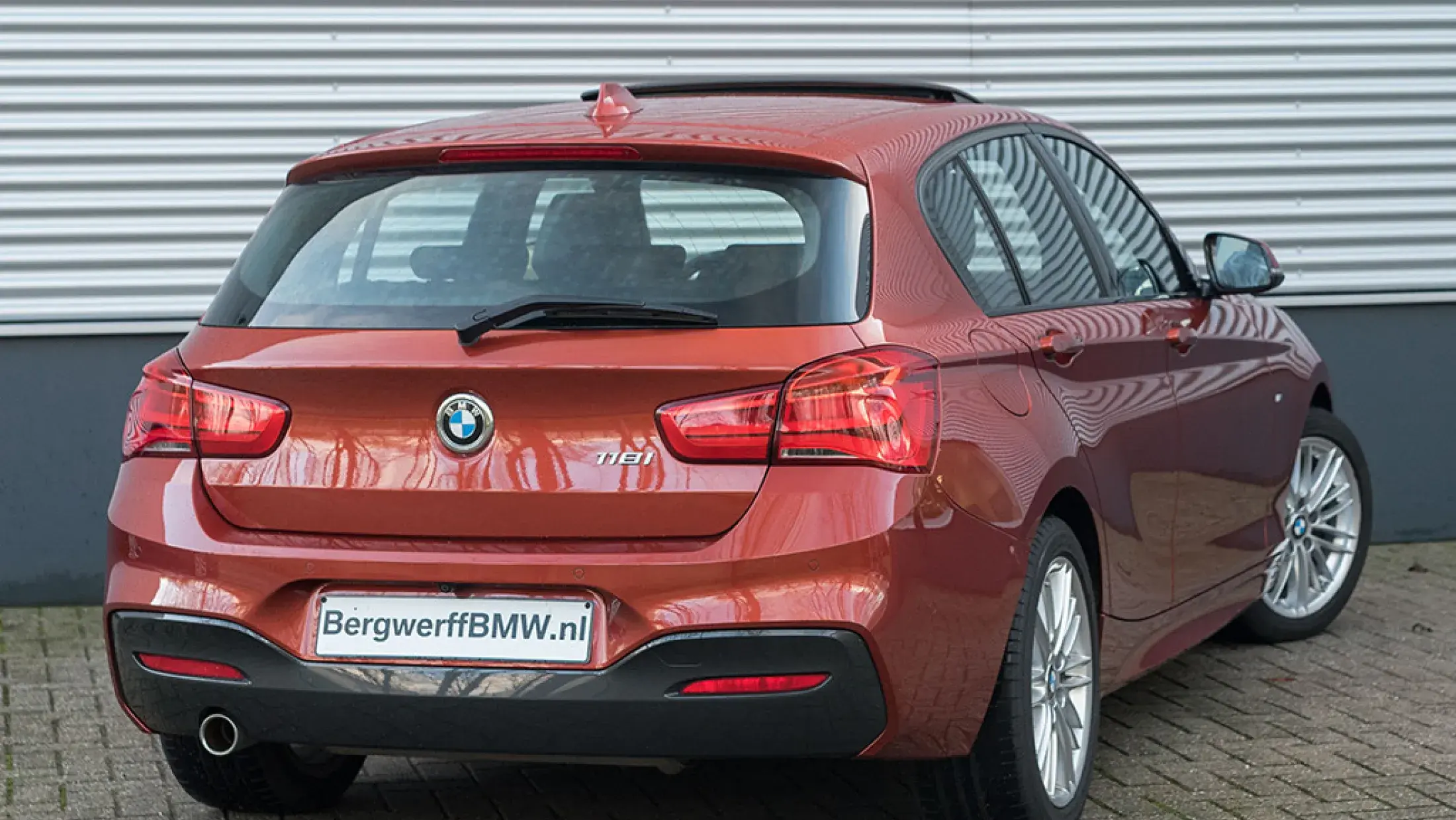 BMW 118i M-Sport High Executive Sunset Orange F20 Bergwerff