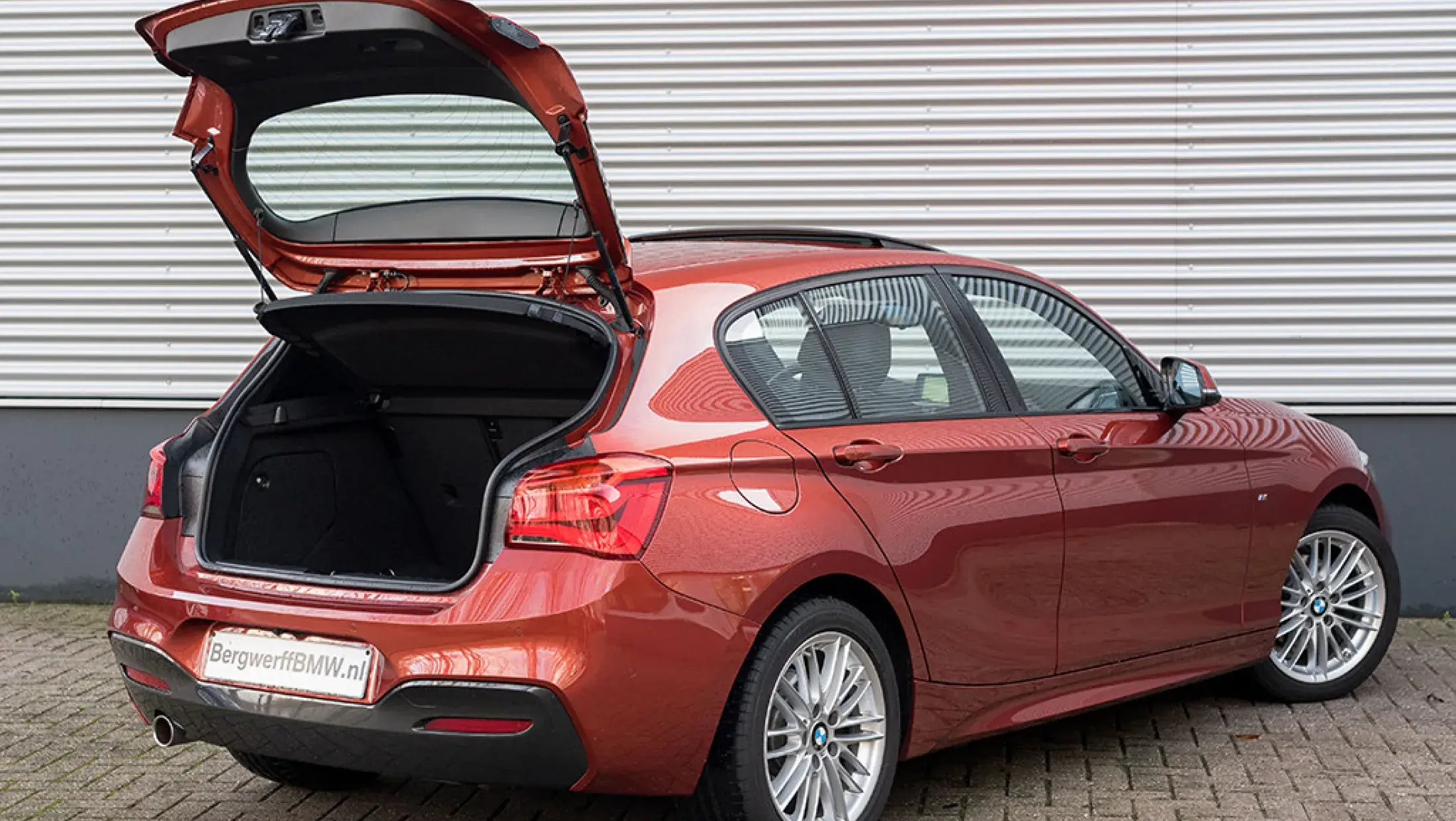 BMW 118i M-Sport High Executive Sunset Orange F20 Bergwerff