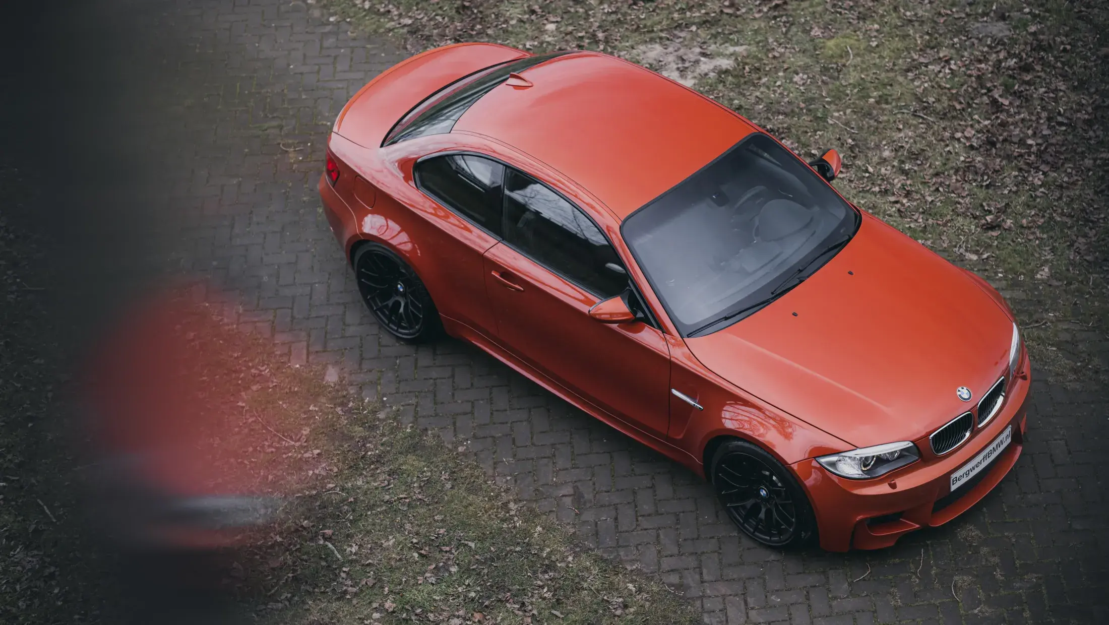 BMW 1M Coupe E82 Valencia Orange Metallic Leder Boston Schwarz met oranje contrasterend stiksel 2011