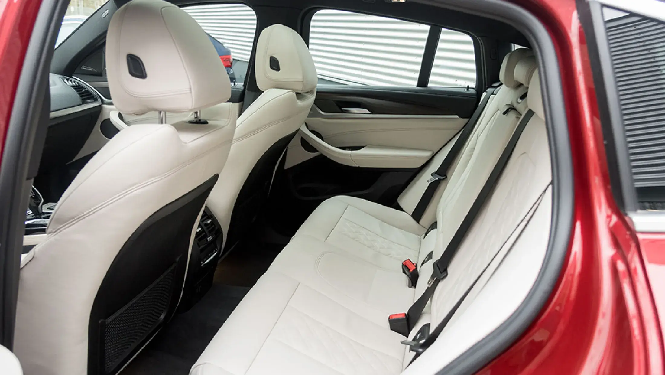 BMW X4 30i Flamenco Red Pearl BMW Individual uitgebreid lederen bekleding Elfenbrown G02 SUV