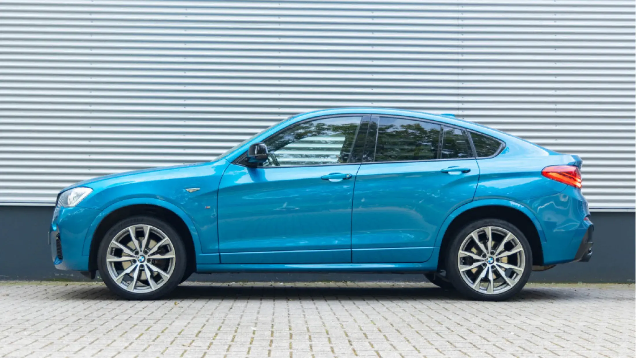 BMW X4 M40i F26 Long Beach Blue Nevada Elfenbeinweiss leder SUV 2016 Bergwerff