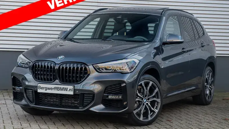 BMW X1 xDrive25e mineral Grey Leder Dakota Schwarz Accent Blau geperforeerd SUV F48